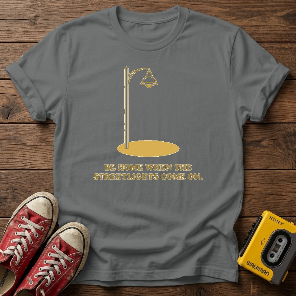 “Be Home When the Streetlights Come On”  T‑Shirt — Graphite Heather wood flat-lay