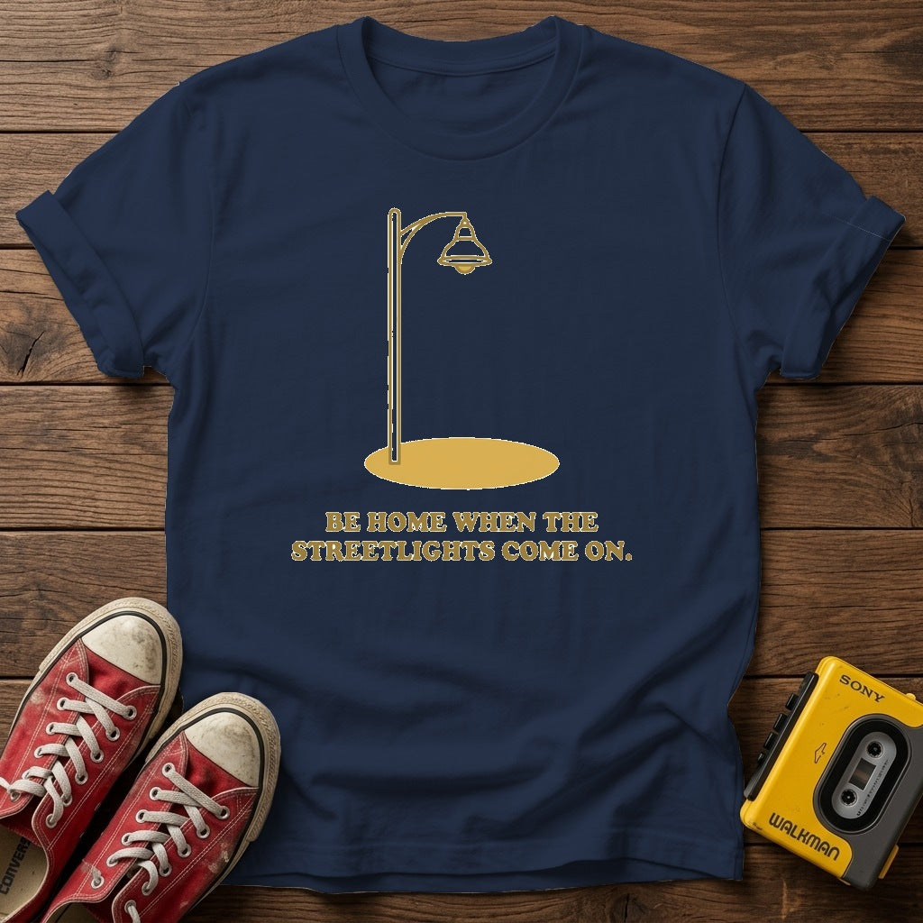 “Be Home When the Streetlights Come On”  T‑Shirt — Navy wood flat-lay