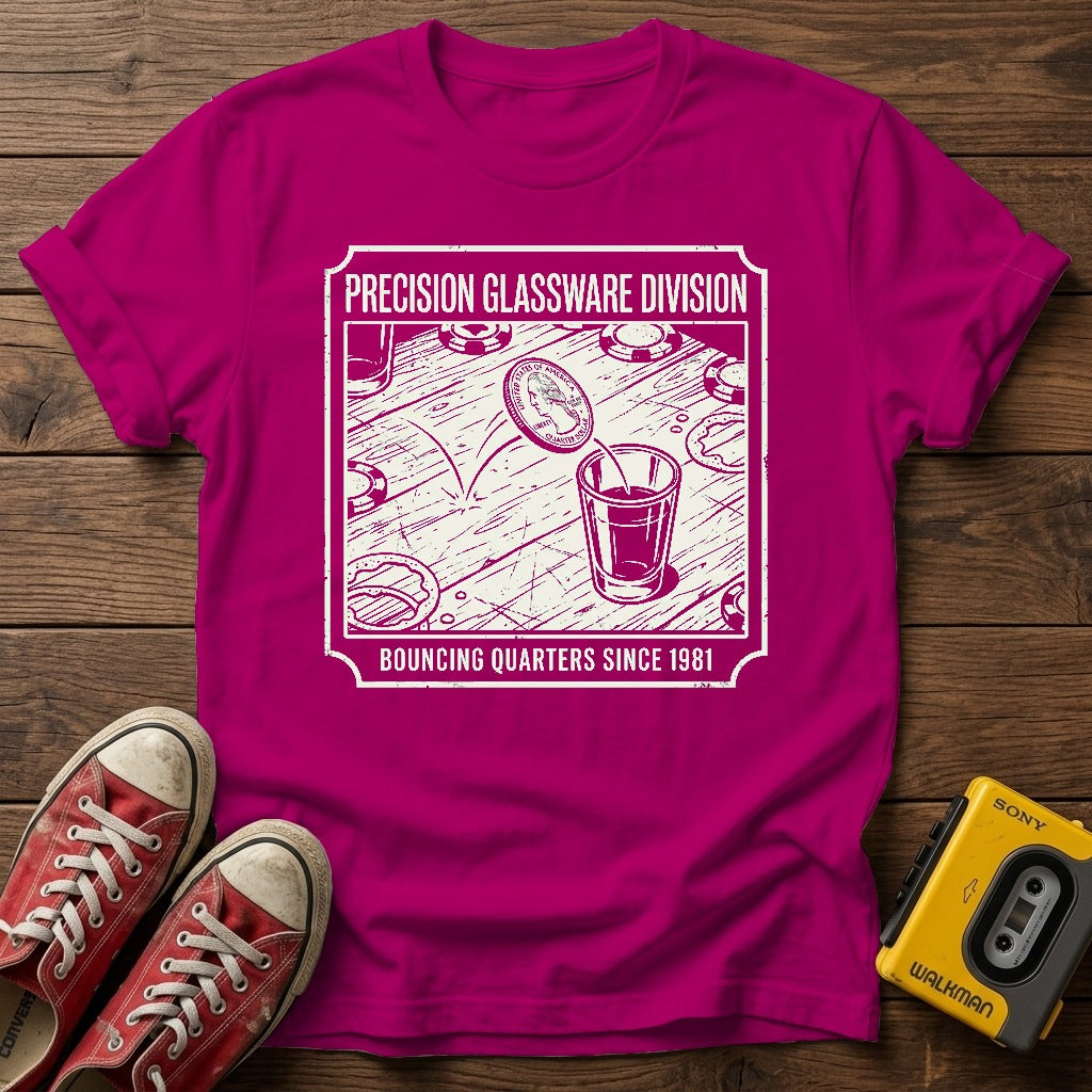"Bouncing Quarters Since 1981" T-Shirt — Antique Heliconia wood flat-lay