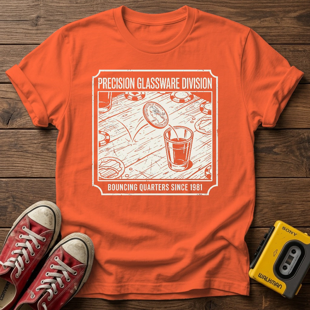 "Bouncing Quarters Since 1981" T-Shirt — Orange wood flat-lay
