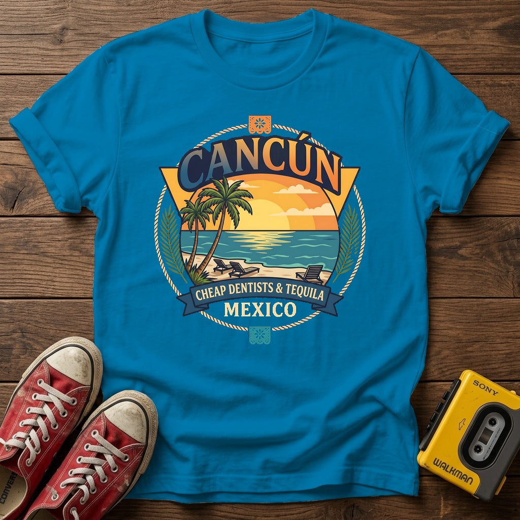 Cancún Beach Sunset T‑Shirt — Heather Sapphire wood flat-lay