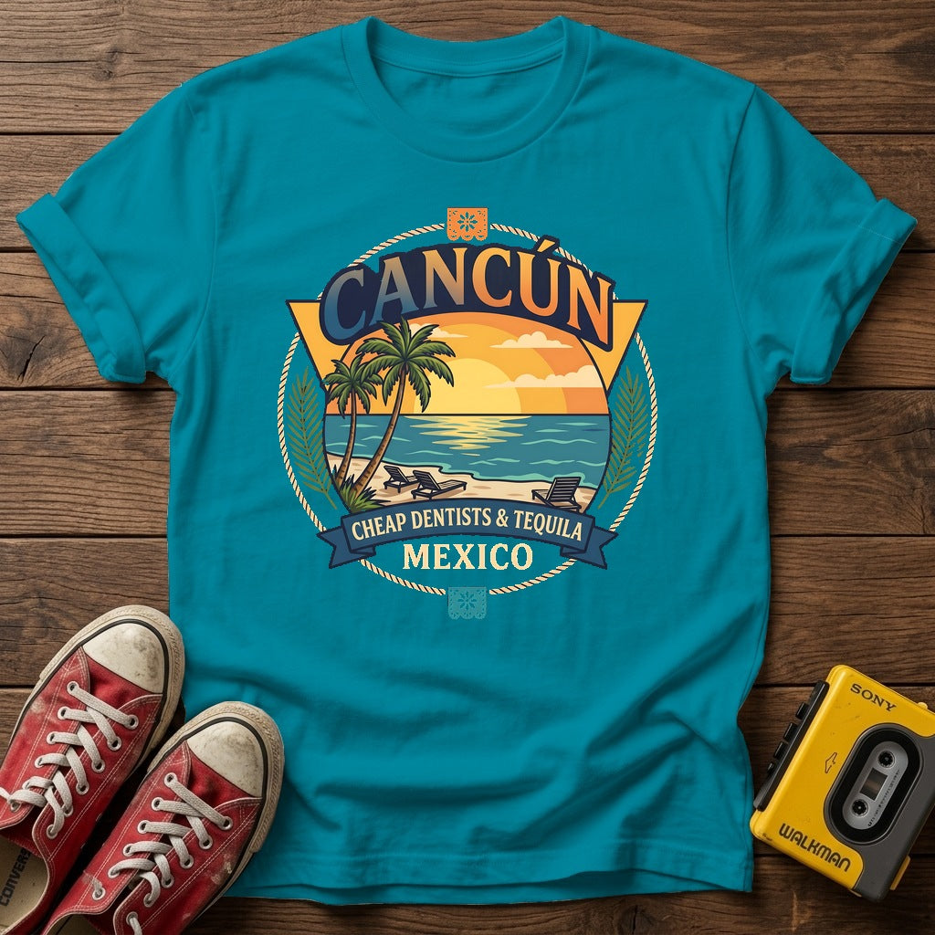 Cancún Beach Sunset T‑Shirt — Tropical Blue wood flat-lay