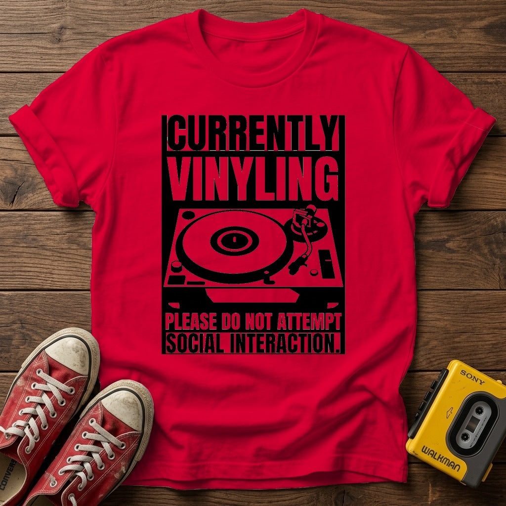 "Currently Vinyling, Please Do Not Attempt Social Interaction" T-Shirt — Red wood flat-lay