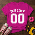 Days Sober 00 Women's T- Shirt — Berry wood flat-lay