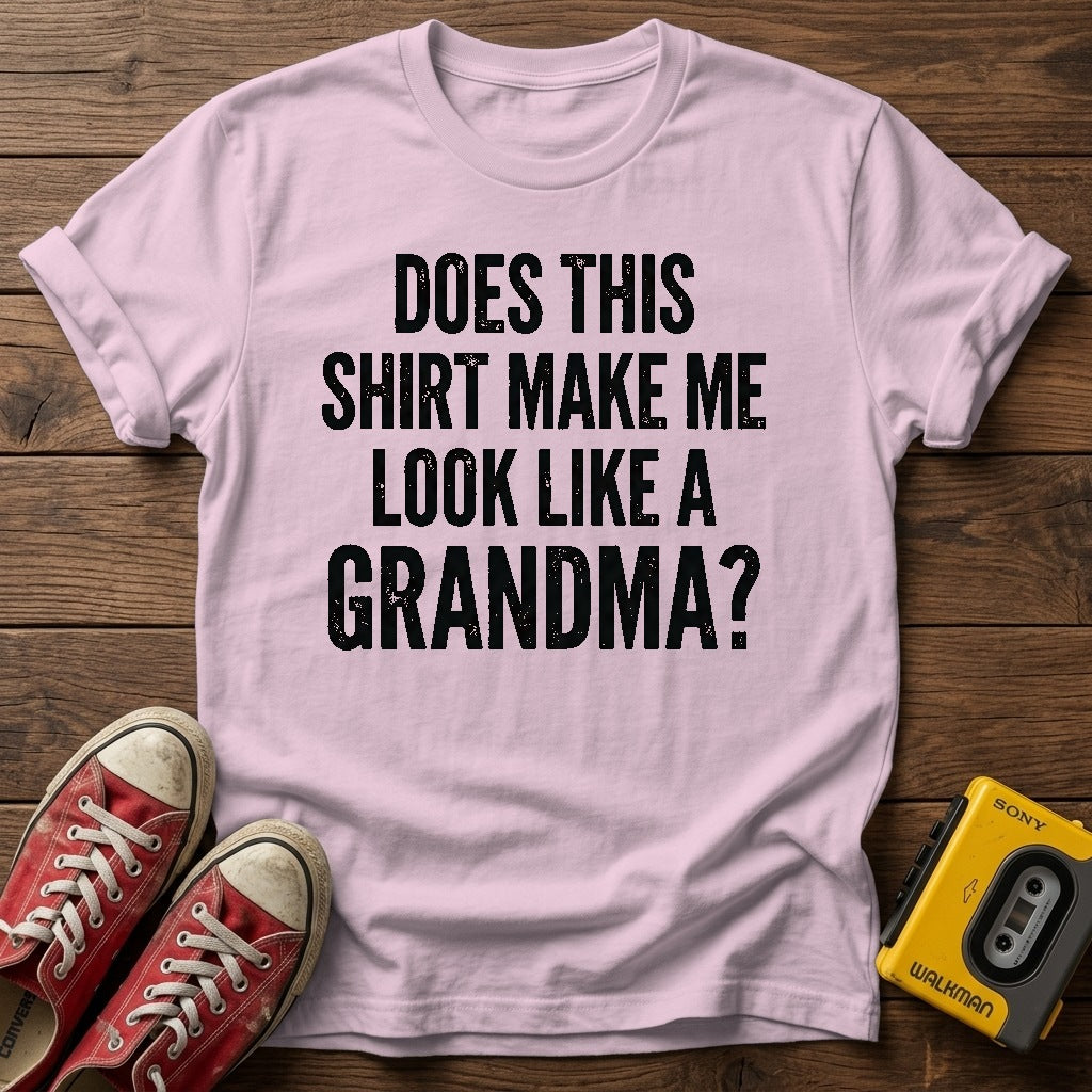 Does This Shirt Make Me Look Like a Grandma? T‑Shirt — Light Pink wood flat-lay