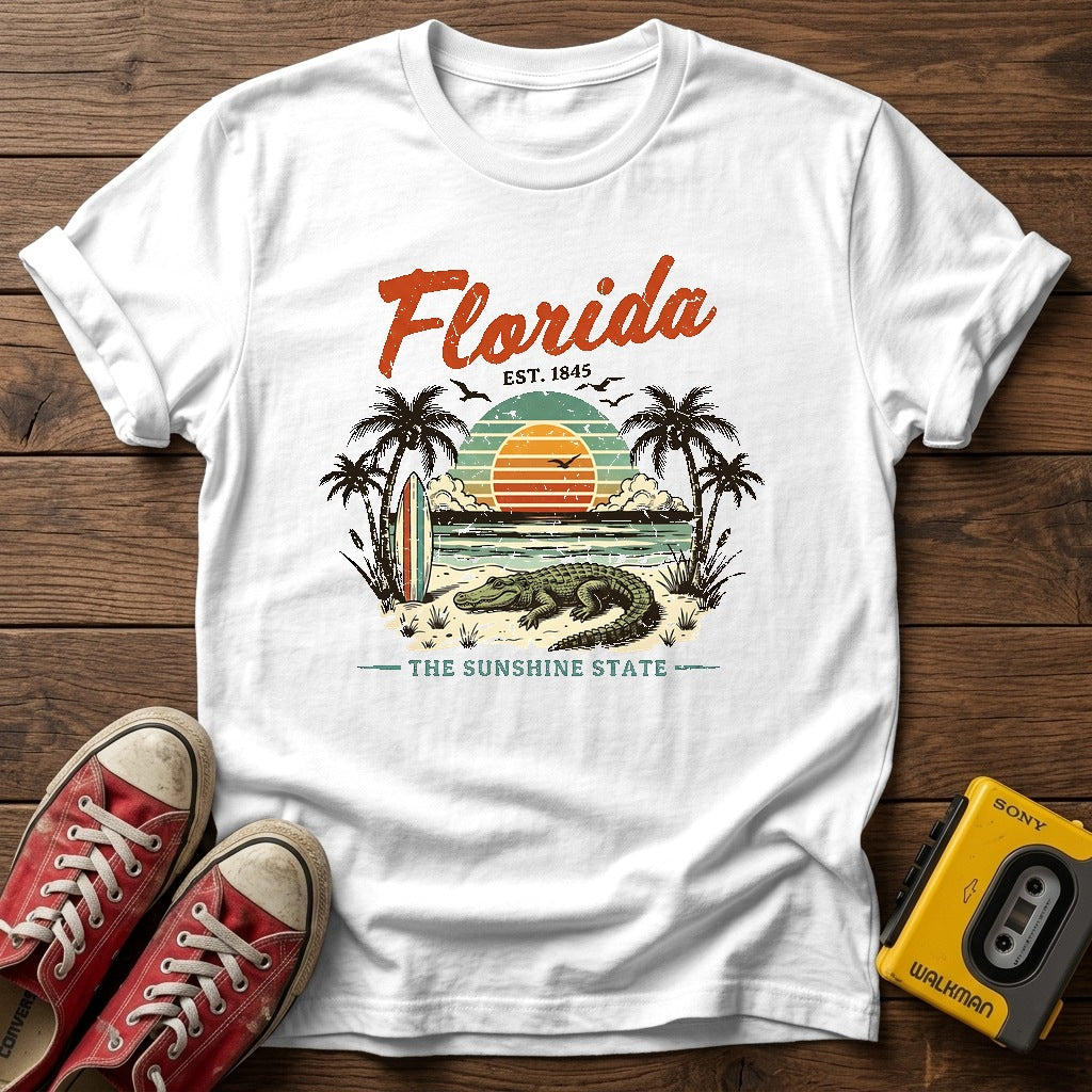 Florida Sunshine State Sunset Palm Tree T-Shirt — White wood flat-lay