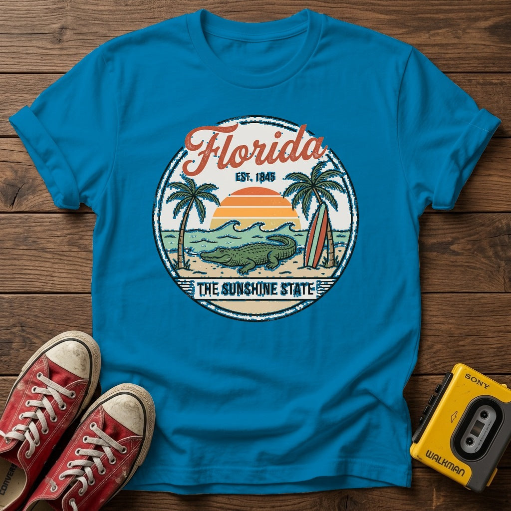 Florida Vintage Surf T-Shirt — Heather Sapphire wood flat-lay