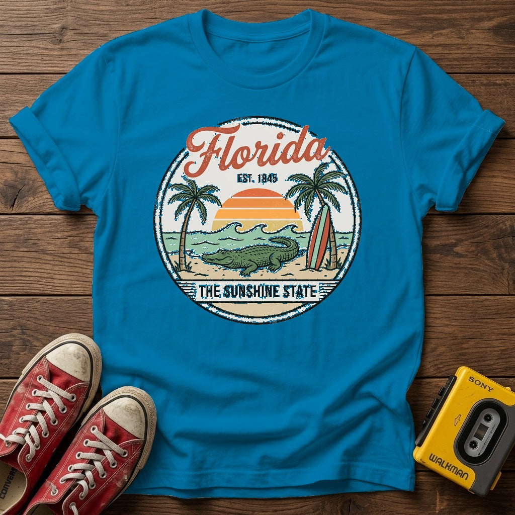 Florida Vintage Surf T-Shirt — Heather Sapphire wood flat-lay