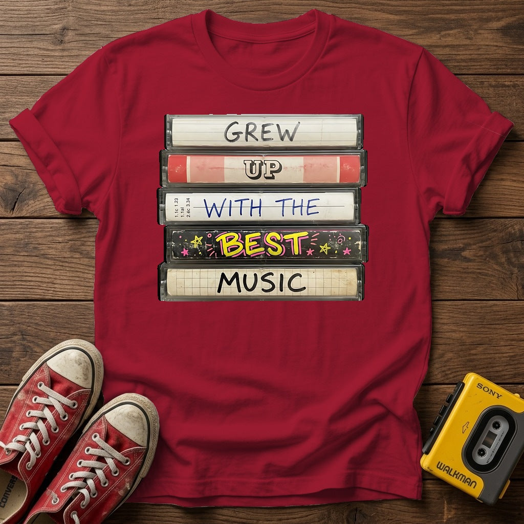 "Grew Up With The Best Music" Vintage Cassette Stack T Shirt — Antique Cherry Red wood flat-lay