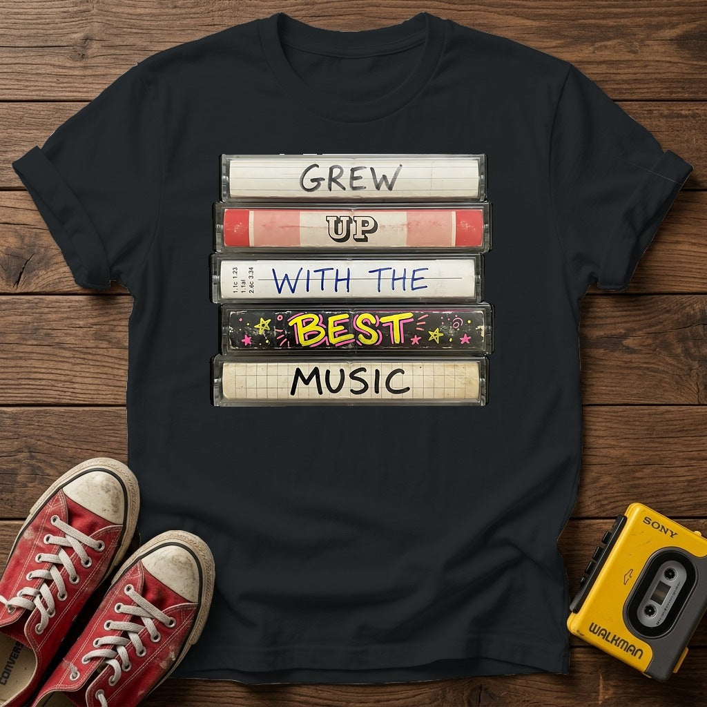 "Grew Up With The Best Music" Vintage Cassette Stack T Shirt — Black wood flat-lay