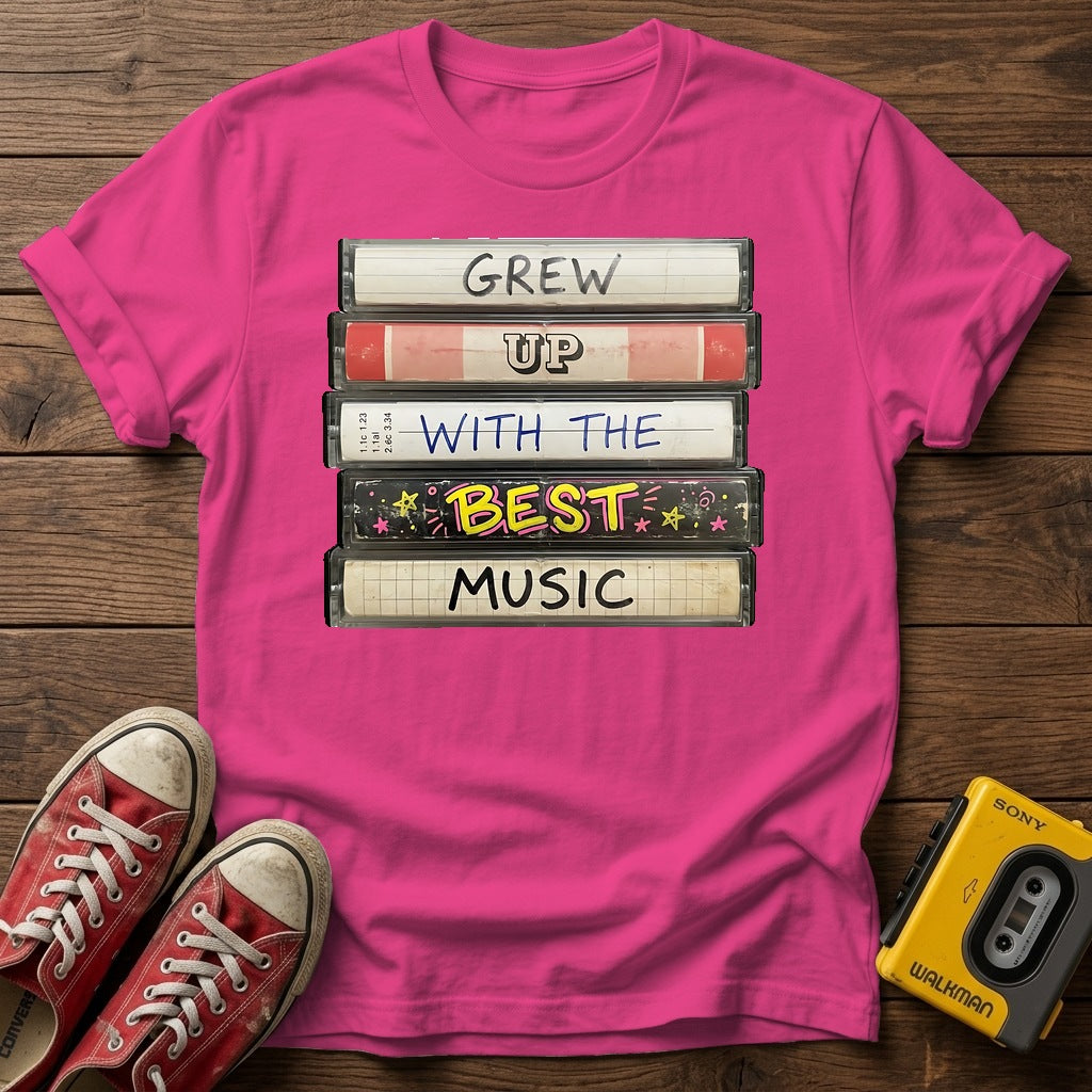 "Grew Up With The Best Music" Vintage Cassette Stack T Shirt — Heather Heliconia wood flat-lay