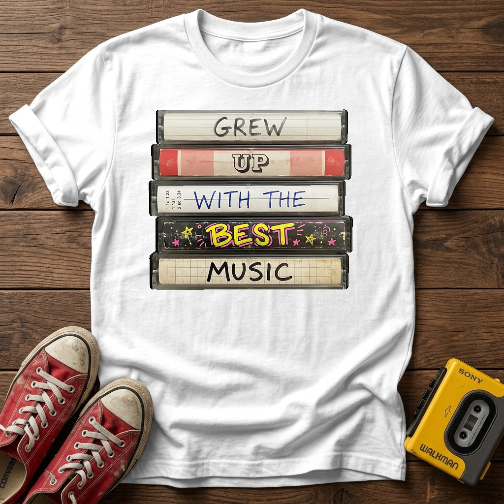"Grew Up With The Best Music" Vintage Cassette Stack T Shirt — White wood flat-lay