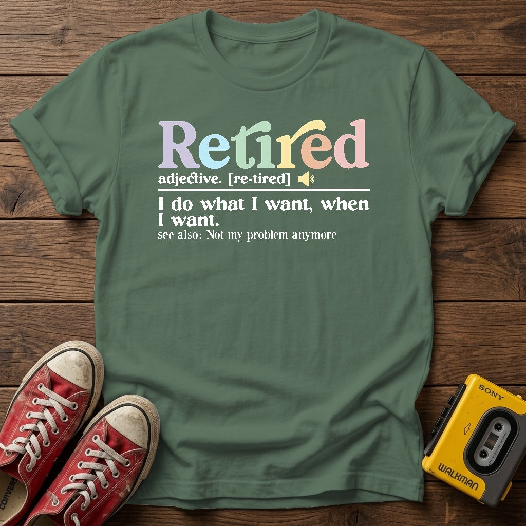 "I do what I want, when I want" Retirement T Shirt — Military Green wood flat-lay