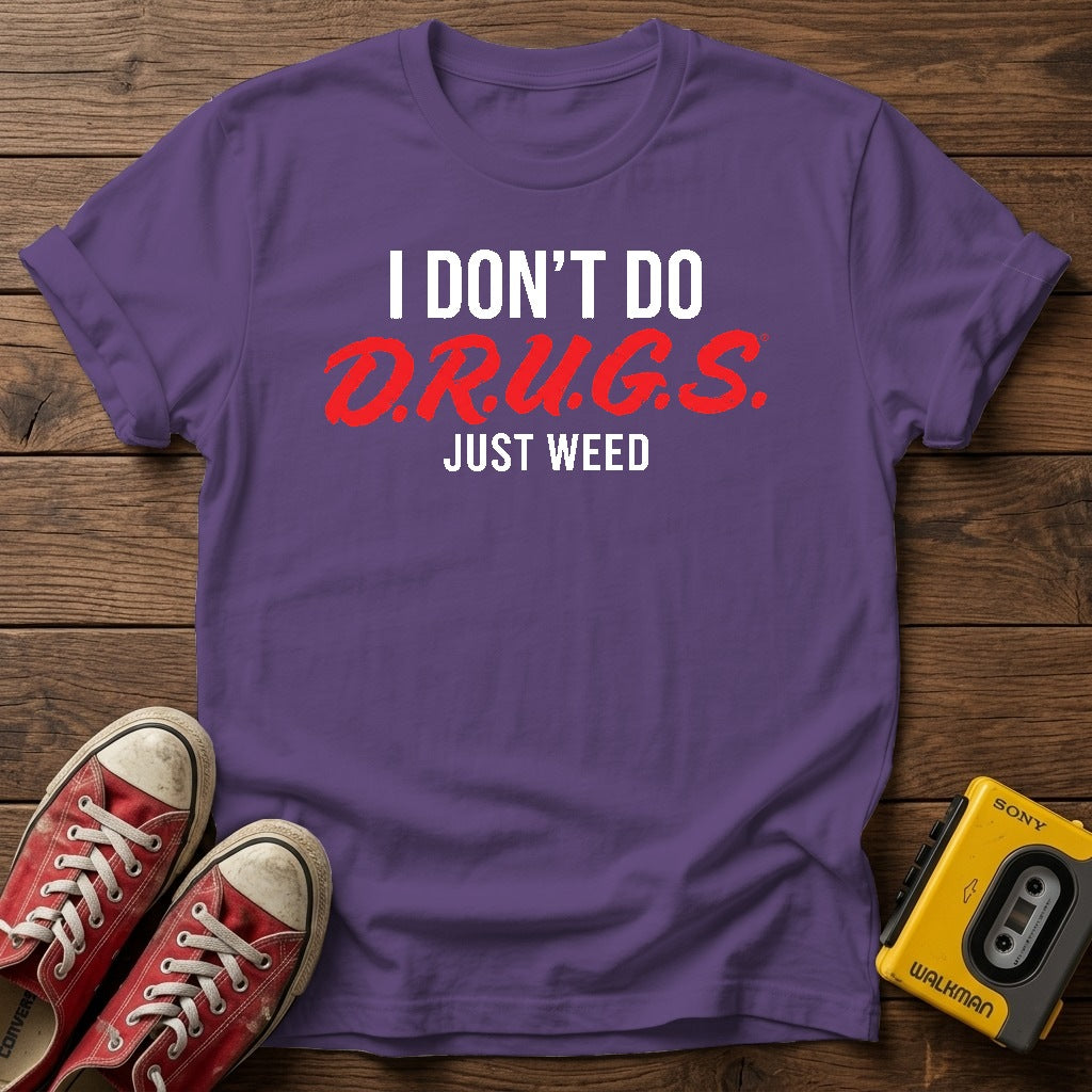 I Don't Do D.R.U.G.S. Just Weed T-Shirt — Heather Purple wood flat-lay