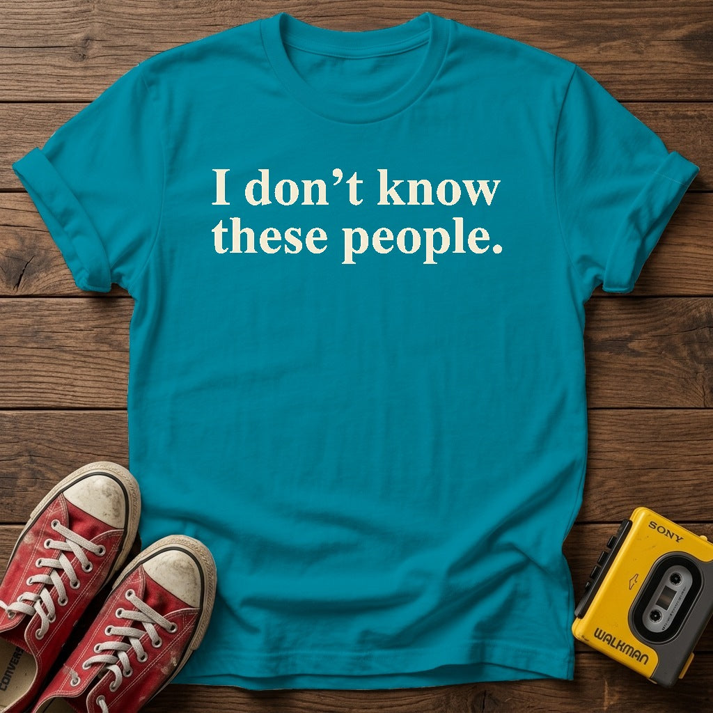 I Don't Know These People T-Shirt — Tropical Blue wood flat-lay