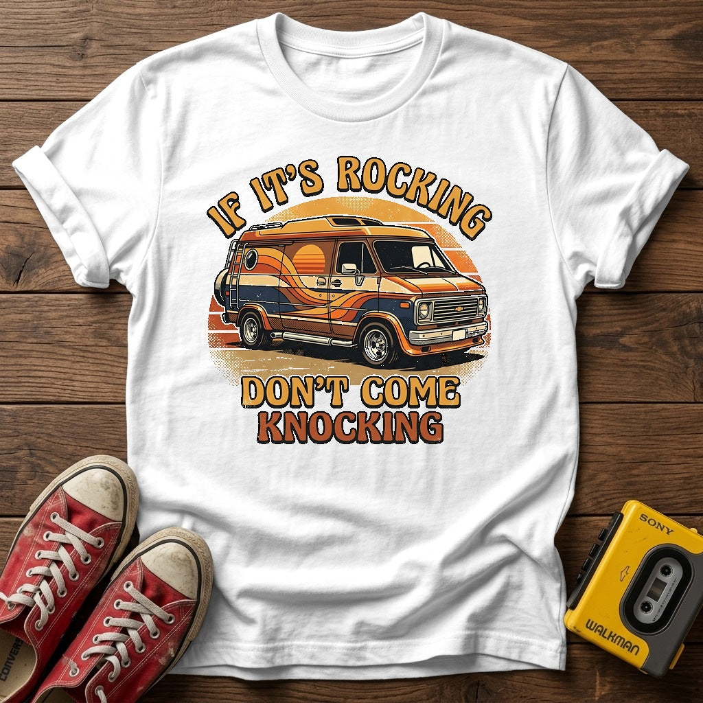"If It's Rocking Don't Come Knocking" T Shirt — White wood flat-lay