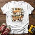 It Always Works Out  T-Shirt — White wood flat-lay