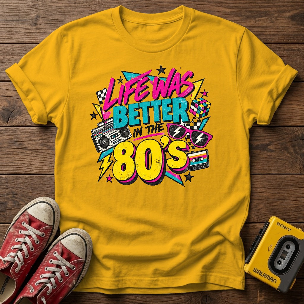 Life Was Better in the 80s T-Shirt — Gold wood flat-lay