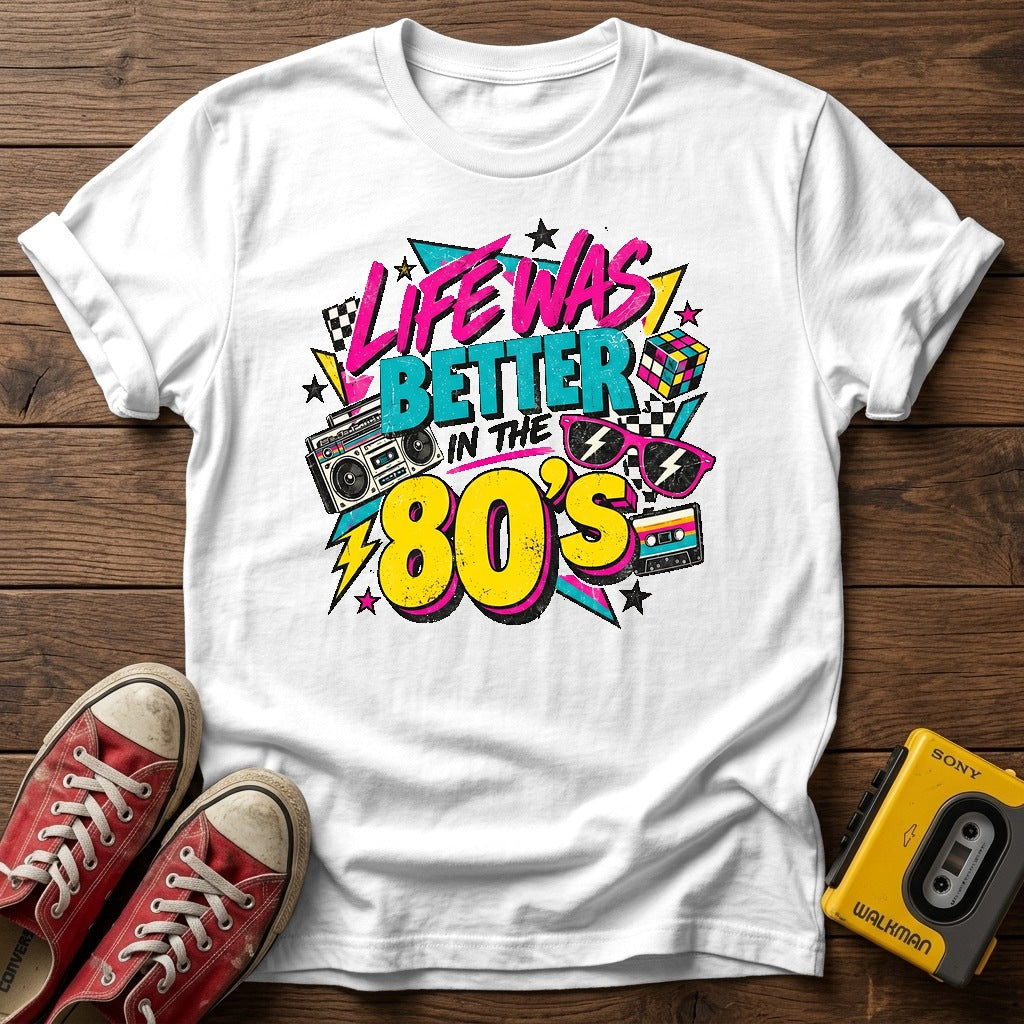 Life Was Better in the 80s T-Shirt — White wood flat-lay