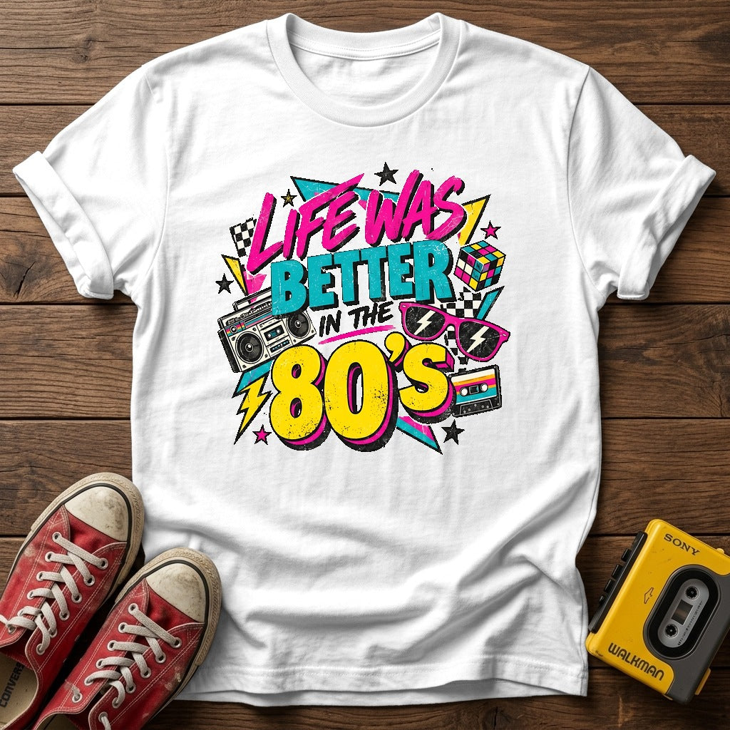 Life Was Better in the 80s T-Shirt — White wood flat-lay