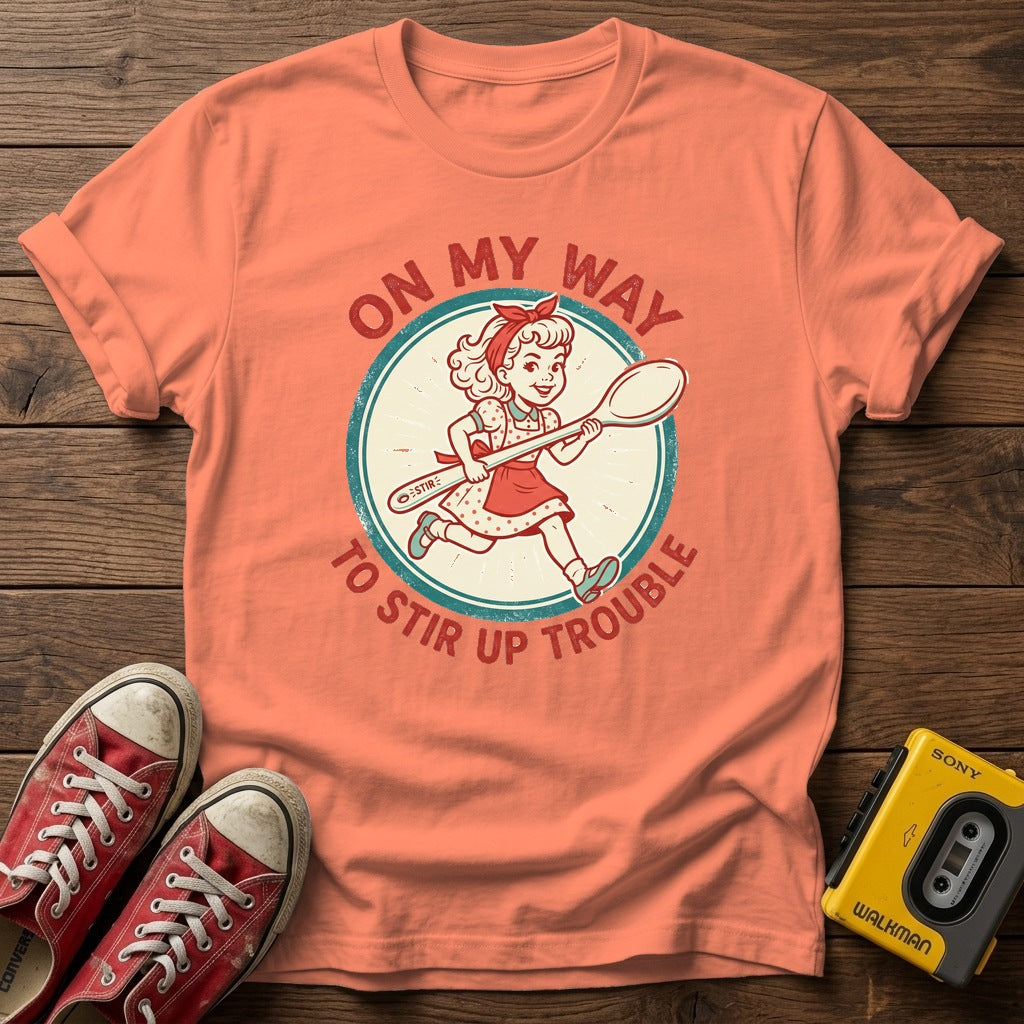 "On My Way to Stir Up Trouble" T-Shirt — Heather Orange wood flat-lay