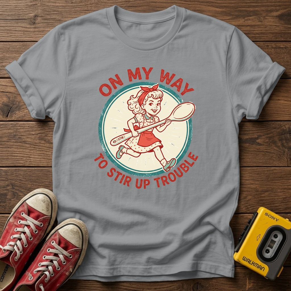 "On My Way to Stir Up Trouble" T-Shirt — Sport Grey wood flat-lay