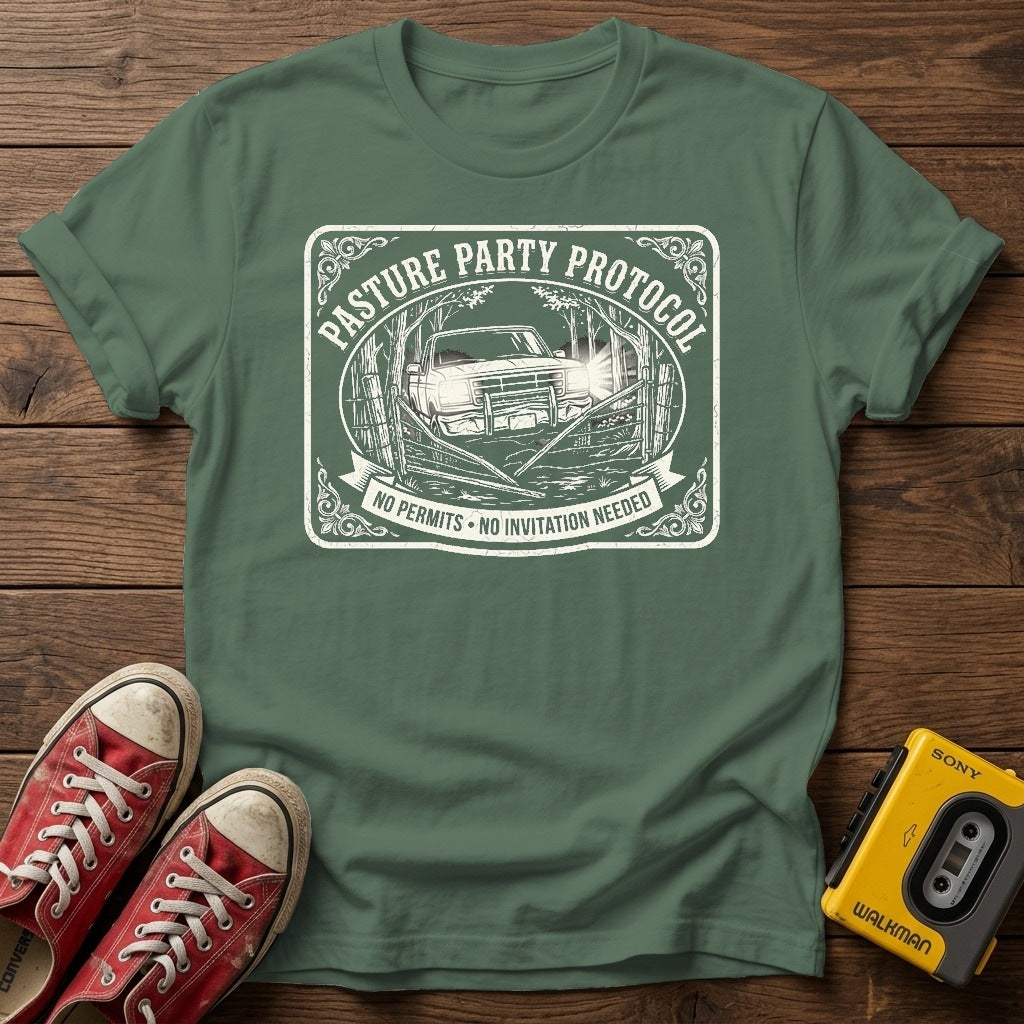 Pasture Party Protocol Graphic T‑Shirt — Military Green wood flat-lay