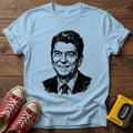 Reagan T-Shirt — Light Blue wood flat-lay