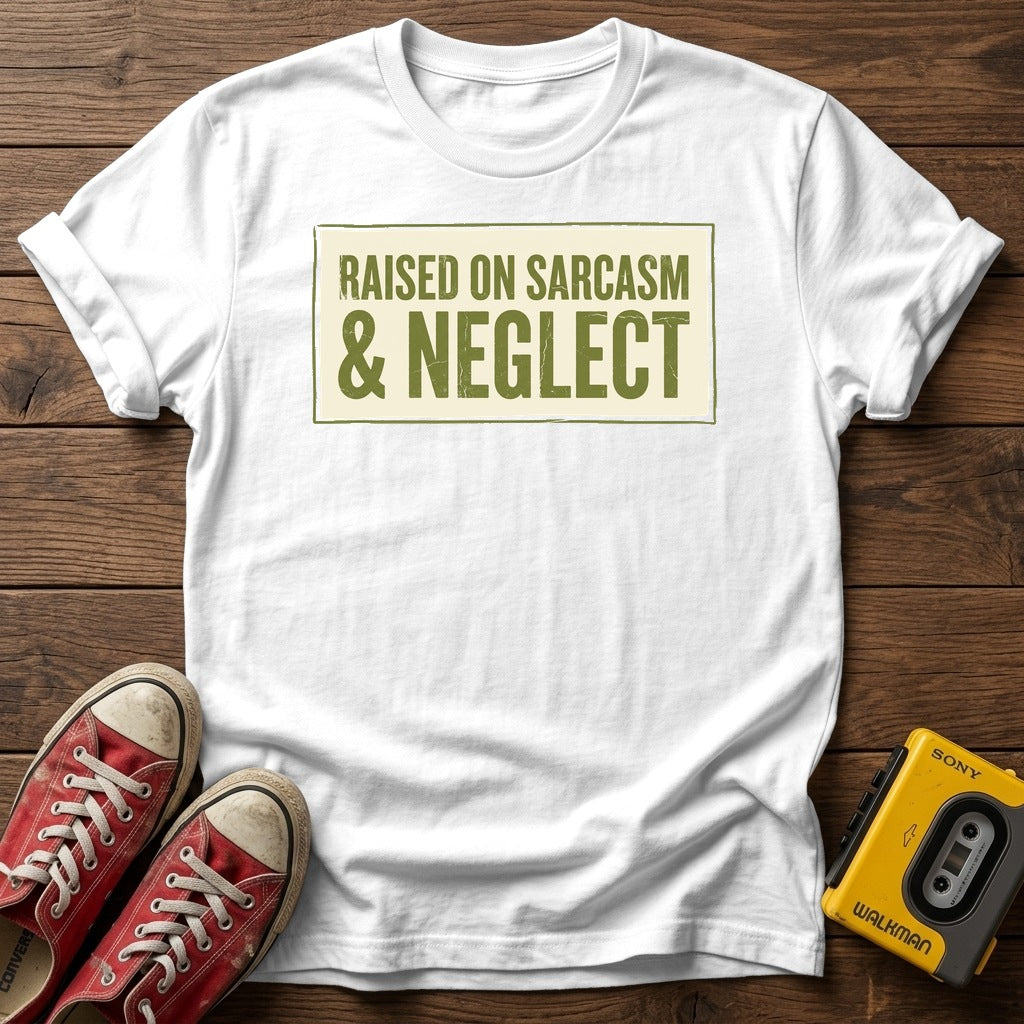 Raised on Sarcasm & Neglect T-Shirt — White wood flat-lay