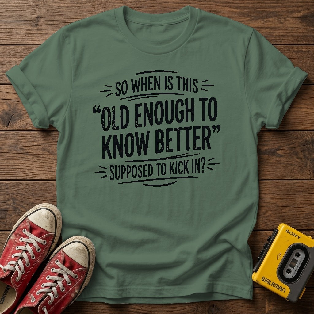 "So When Is This 'Old Enough to Know Better' Supposed to Kick In?" T Shirt — Military Green wood flat-lay