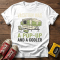 Vacation Was a Pop-Up and a Cooler T-Shirt — White wood flat-lay